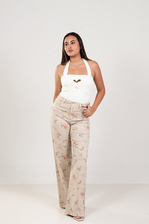Blusa drapeada con herraje dorado