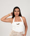 Blusa drapeada con herraje dorado